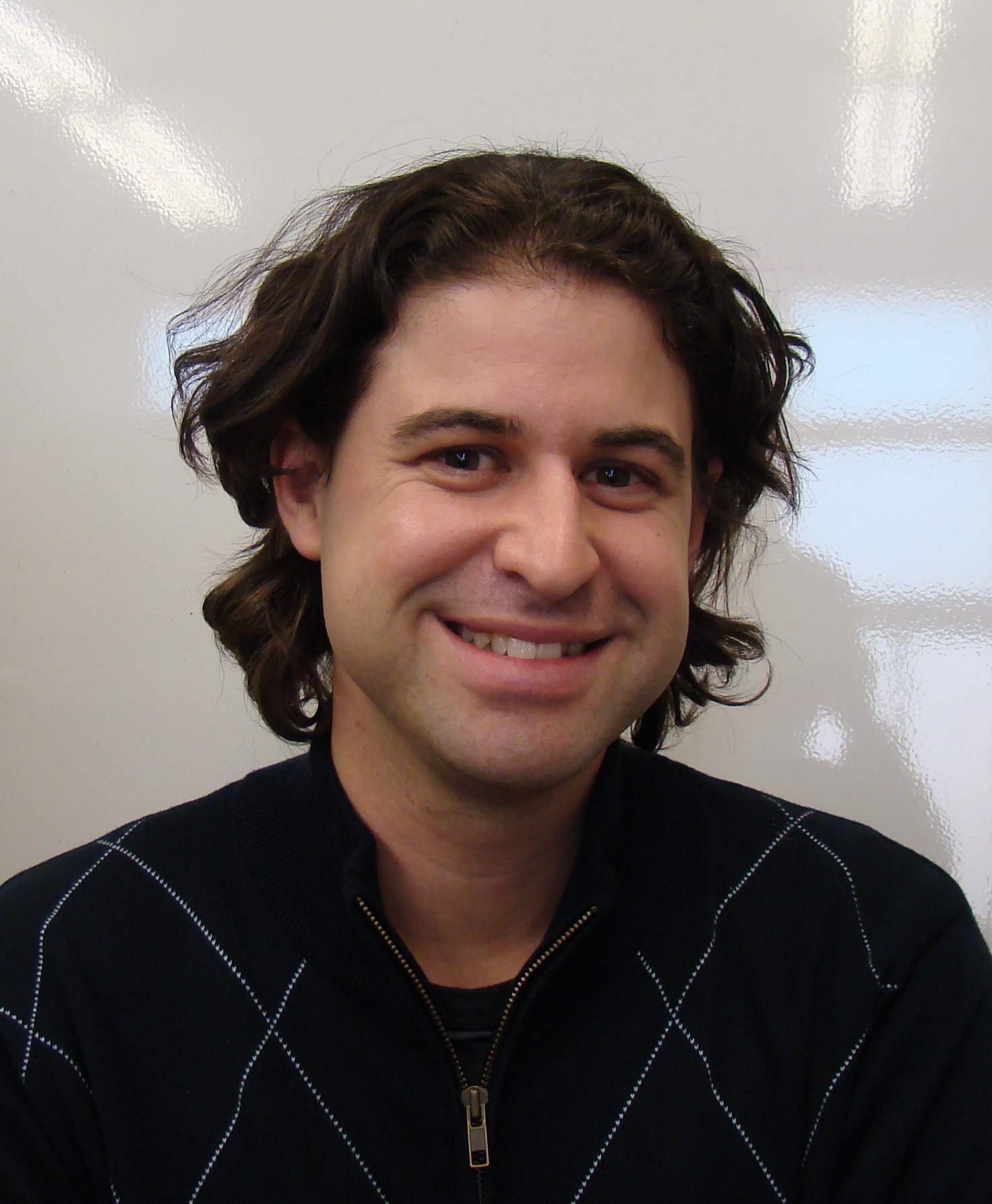 Assistant Professor Damon Tumes, Ph.D